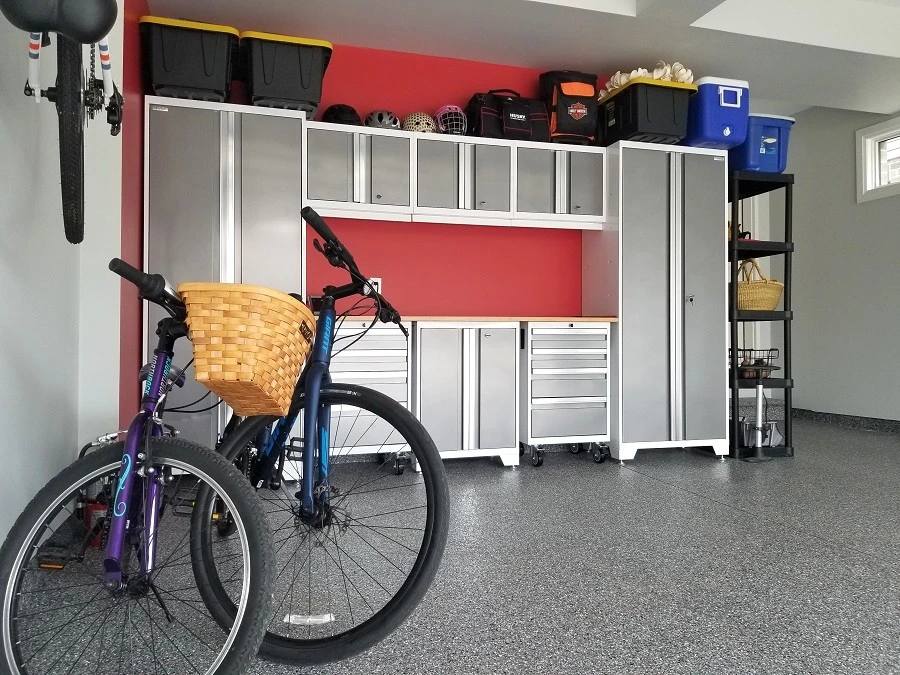 garage with white cabinets